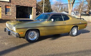 Plymouth-gold-duster-1973-brown-26