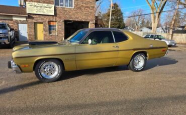Plymouth-gold-duster-1973-brown-31