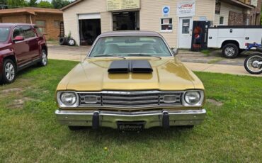 Plymouth-gold-duster-1973-brown-48