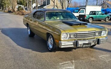 Plymouth-gold-duster-1973-brown-71