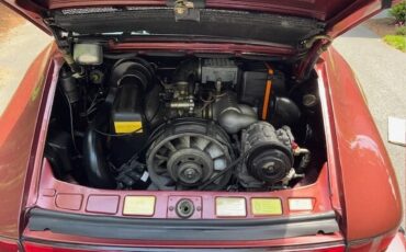 Porsche-911-1986-Garnet-Red-Metallic-Beige-4