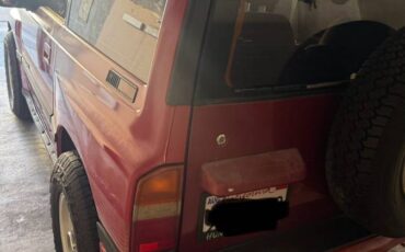 Suzuki-sidekick-1989-red-1