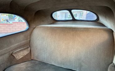 Two-door-ford-sedan-1940-green-14