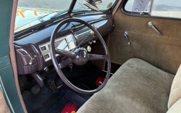 Two-door-ford-sedan-1940-green-17