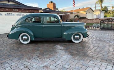 Two-door-ford-sedan-1940-green-23