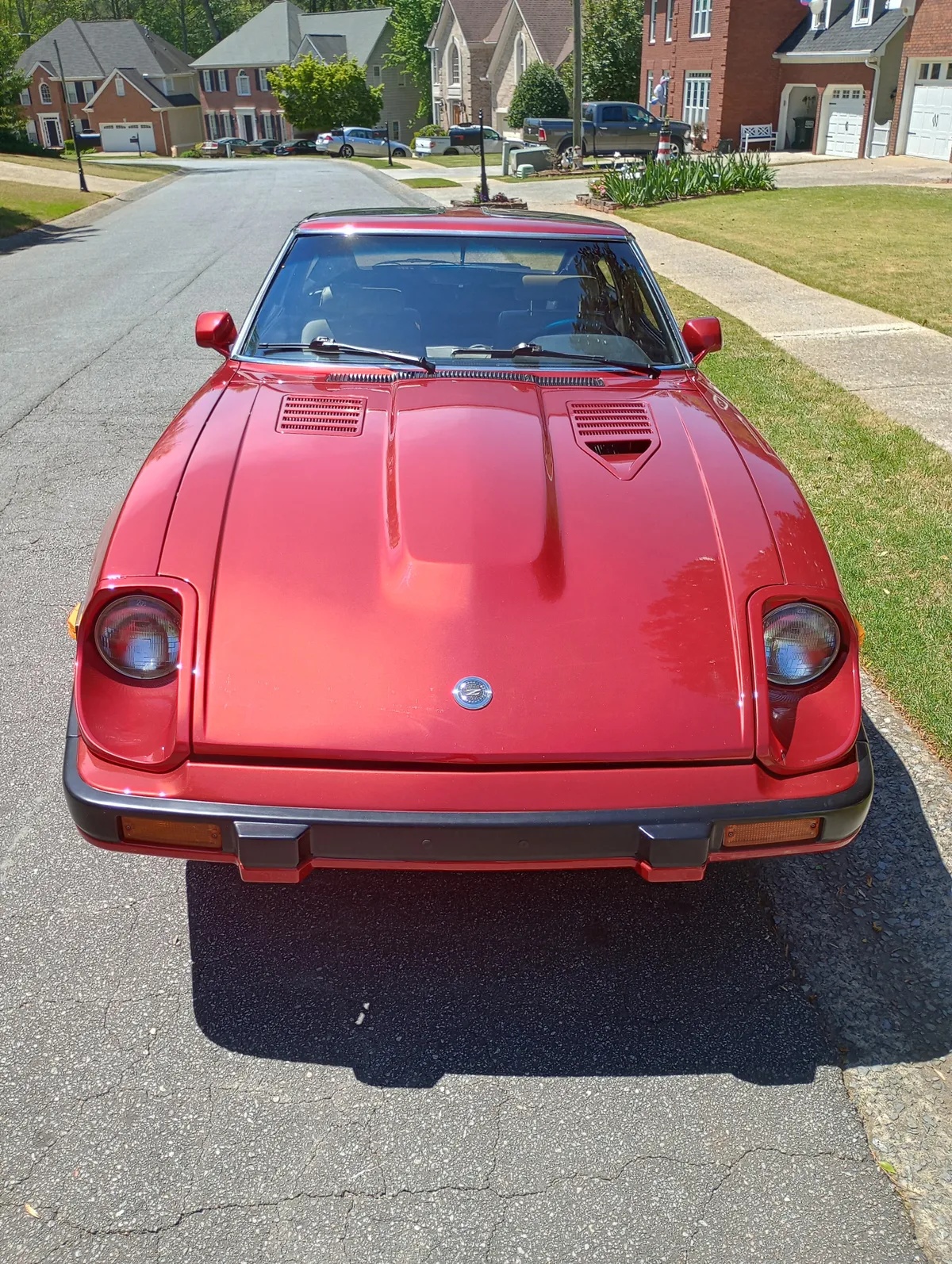 Datsun-280zx-1983-Candy-Apple-Red-Grey-Leather