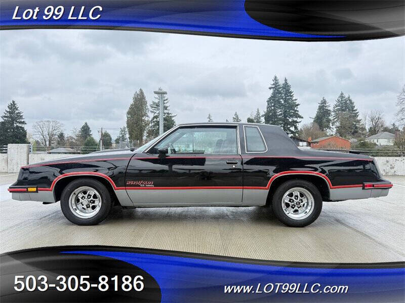 Oldsmobile-Cutlass-calais-1983-Black-Burgundy
