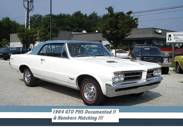 Pontiac-Gto-documented-1964-White-Blue-Top-Blue-Bucket-Seats