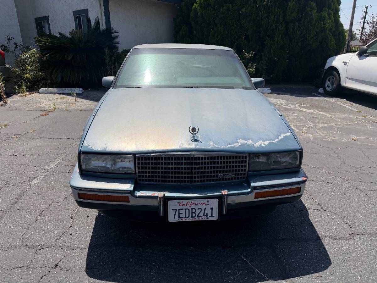 Cadillac-Coupe-deville-1986-blue