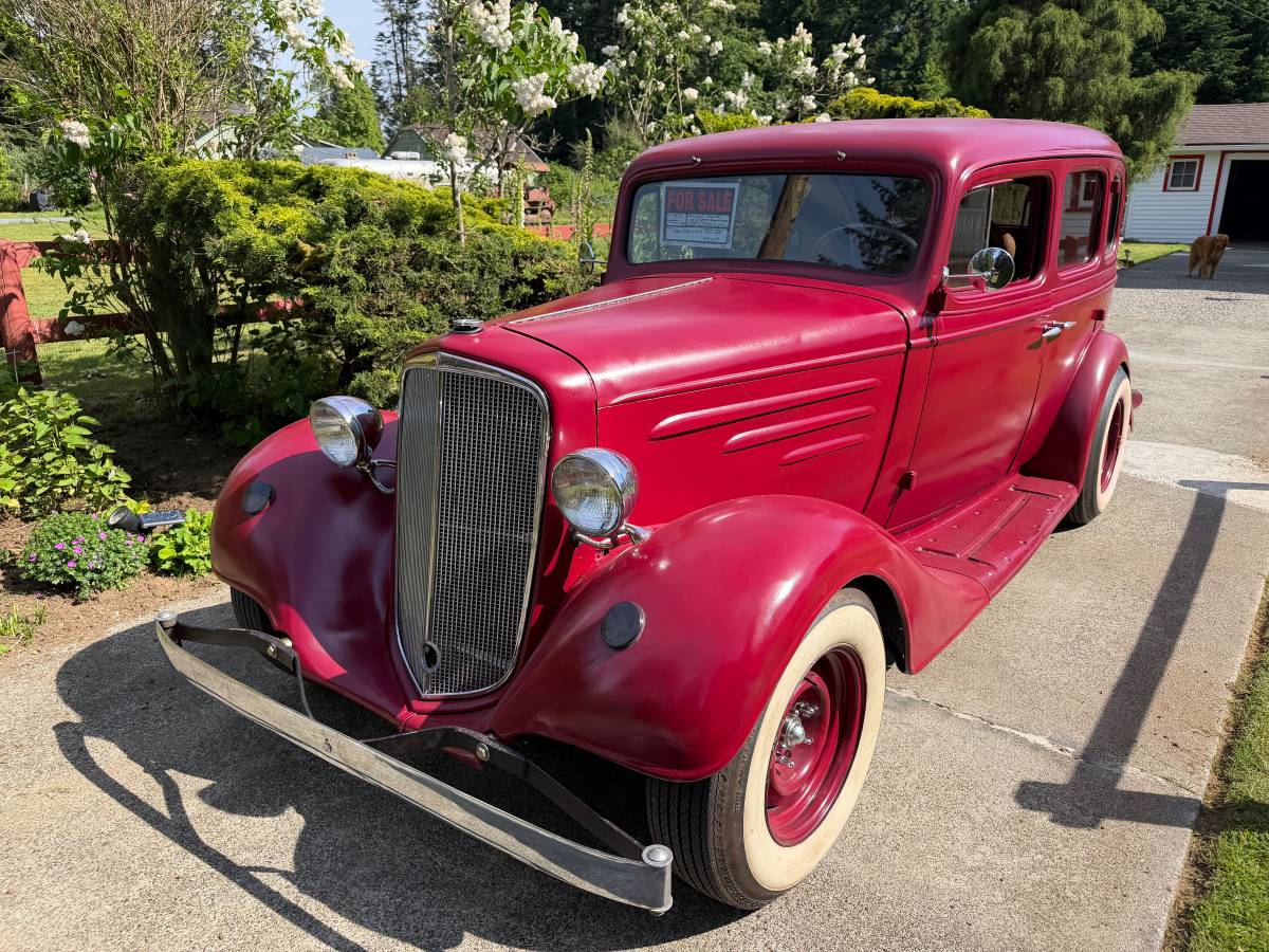 Chevrolet-Standard-suicide-rear-doors-1934-red