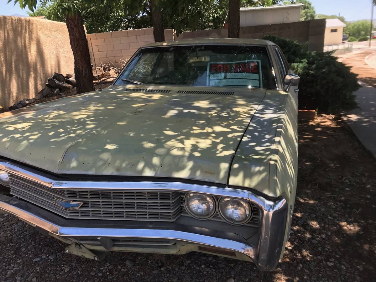 Chevy-impala-sedan-1969-green