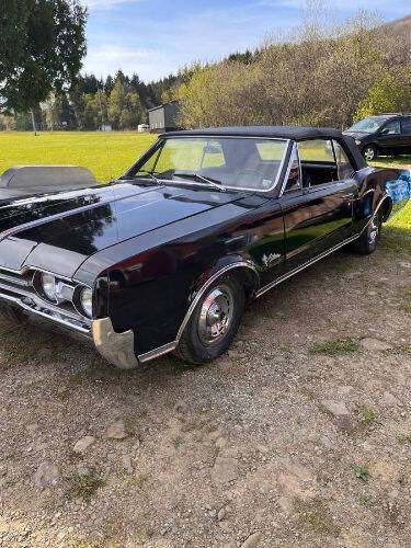 Oldsmobile-Cutlass-1967-Triple-Black