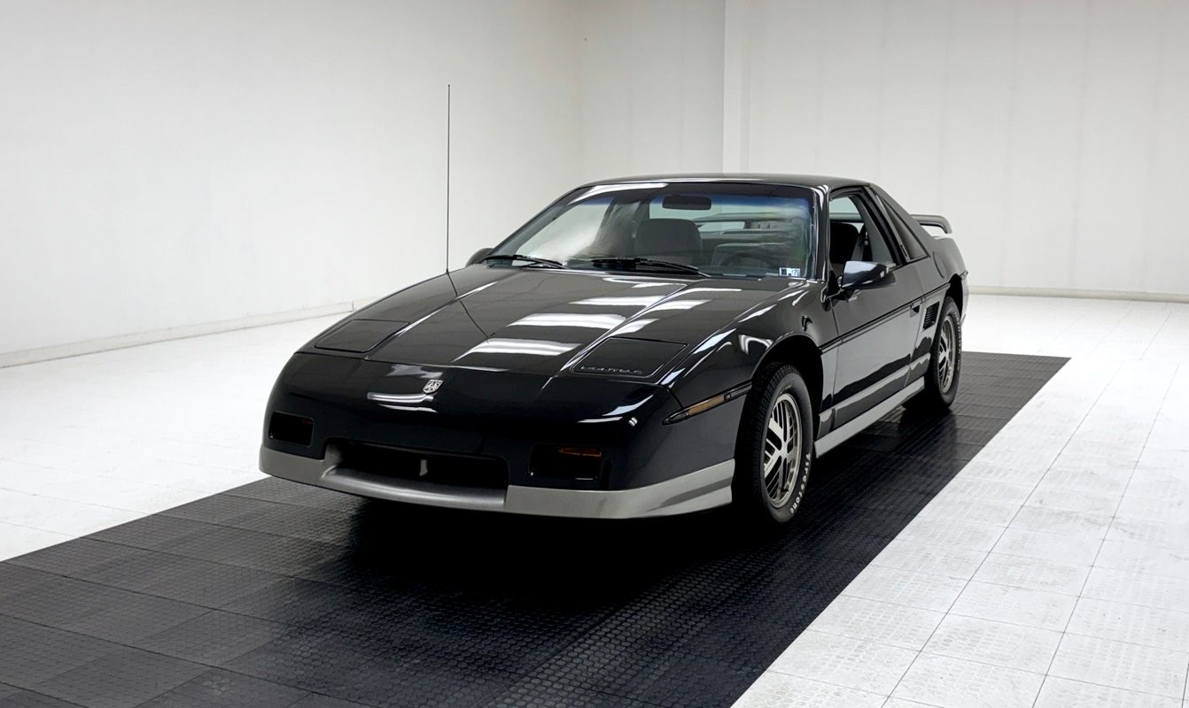 Pontiac-Fiero-1985-Coupe-Charcoal-Gray