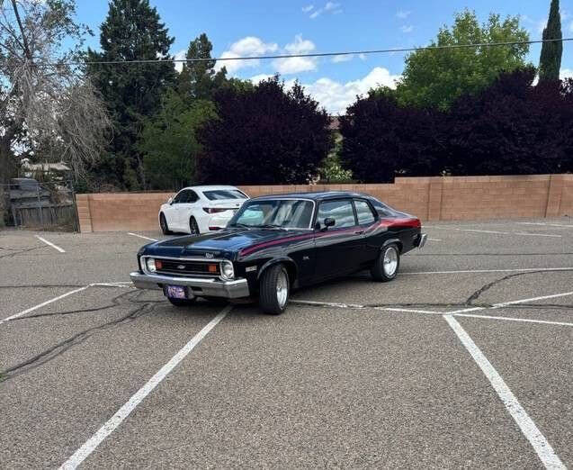 Chevrolet-Nova-1974-Black-W-Red-Stripe-Black