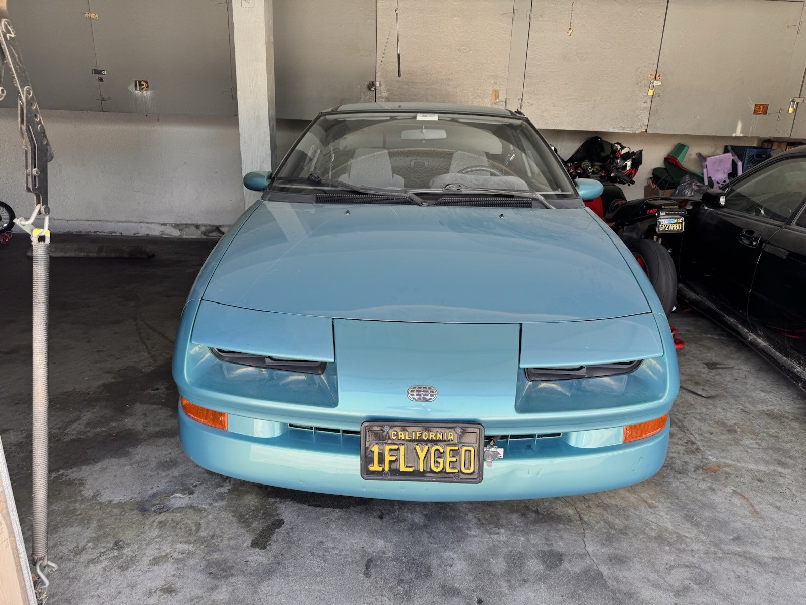 Geo-Storm-1990-Hatchback-Gray