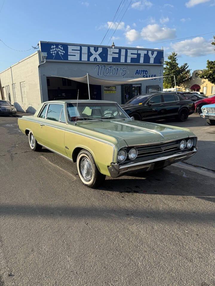 Oldsmobile-Cutlass-1964-Green-Green
