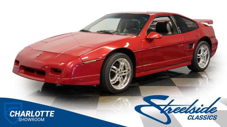 Pontiac-Fiero-1987-Medium-Red-Metallic-Light-Grey