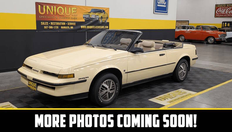 Pontiac-Sunbird-1987-Yellow