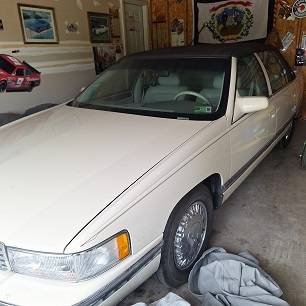 Cadillac-Deville-sedan-4d-1996-yellow