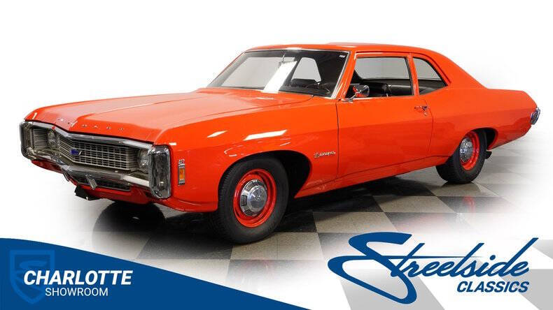 Chevrolet-Biscayne-1969-Hugger-Orange-Black