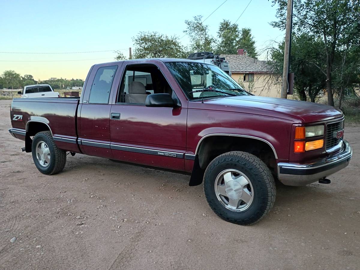 Gmc-Sierra-1500-sle-4x4-1996-purple