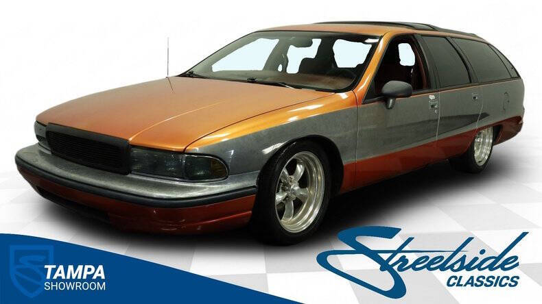 Oldsmobile-Custom-cruiser-1992-Orange-Metallic-Maroon