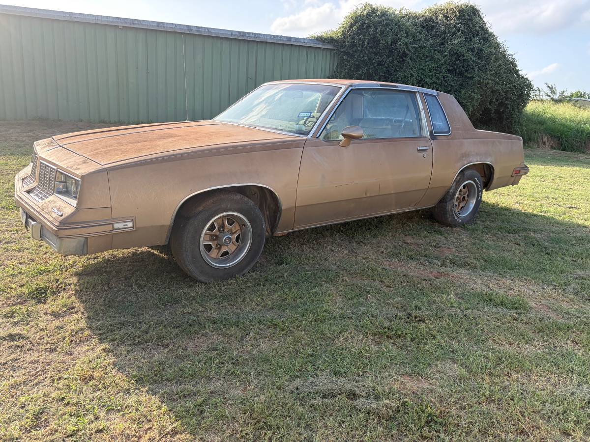 Oldsmobile-Cutlass-supreme-1985-brown