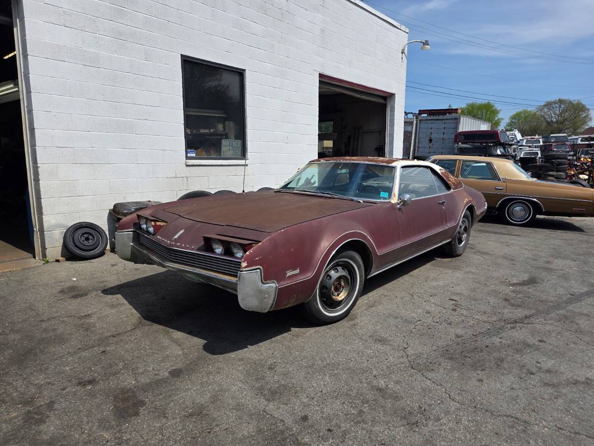 Oldsmobile-Toronado-1966-red