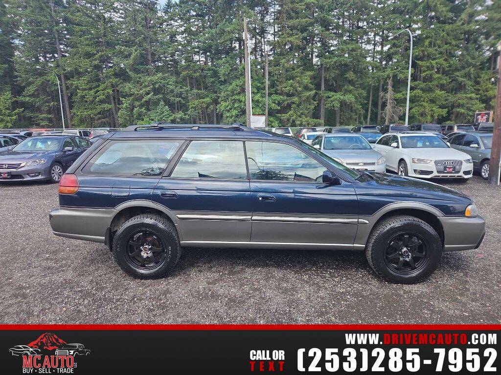 Subaru-Legacy-outback-gas-wagon-1996-blue