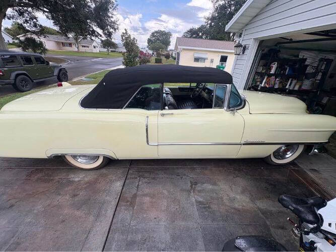 Cadillac-Series-62-1955-YellowBlack-Top-Black