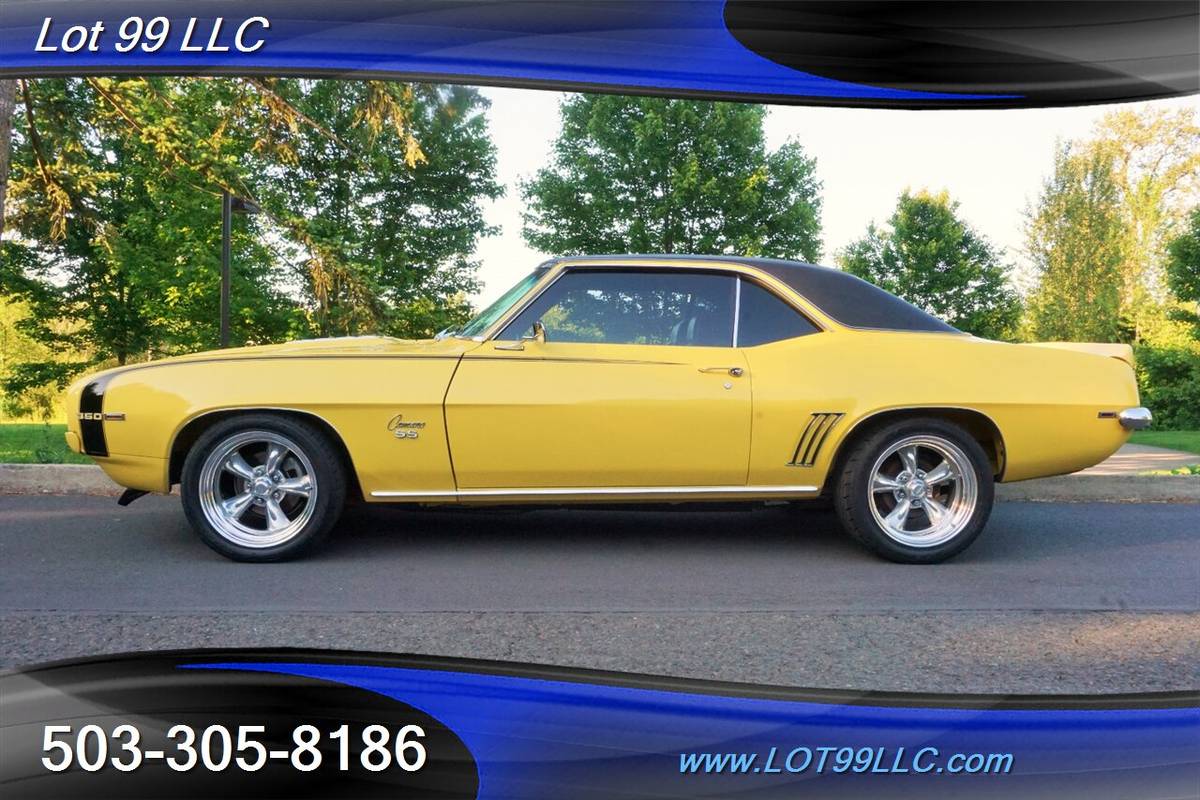 Chevrolet-Camaro-ss-4-speed-manual-rotisserie-restoratio-1969-yellow