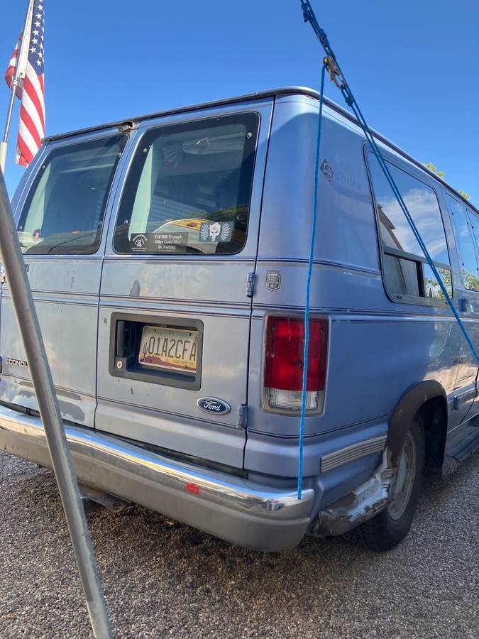 Ford-E150-conversion-van-1996-blue