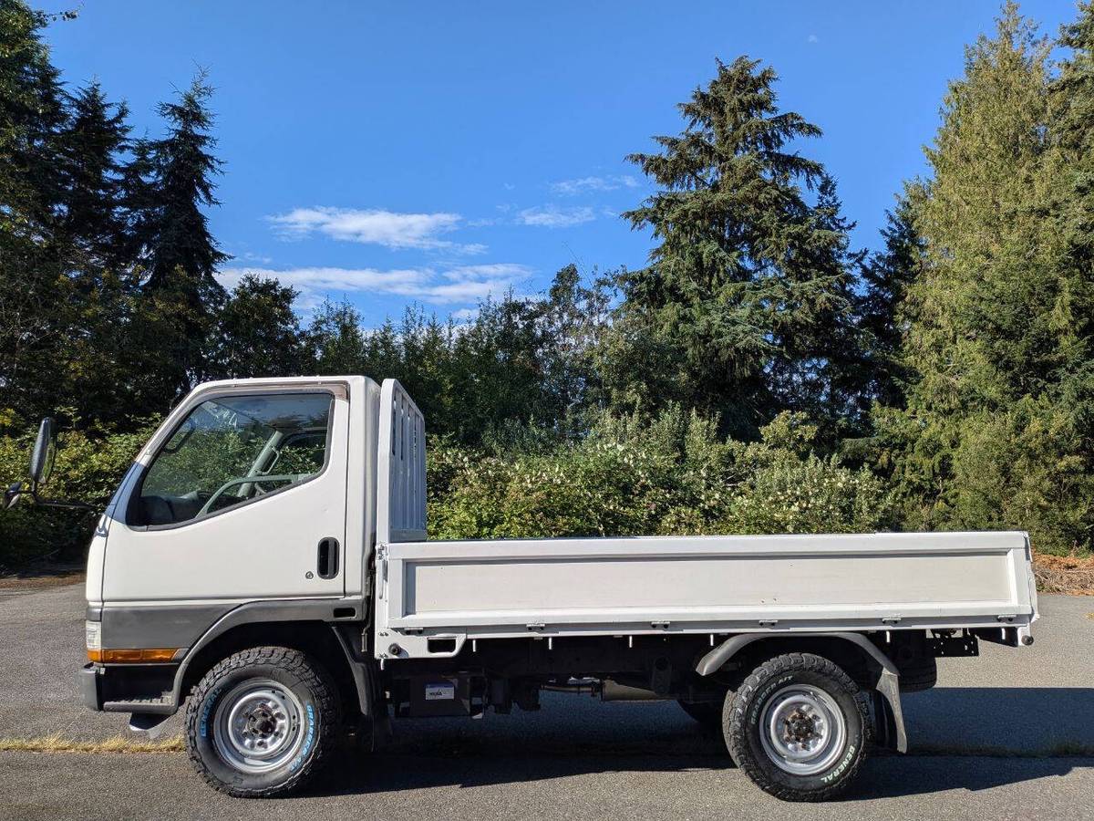 Nissan-Atlas-4x4-5-speed-10-foot-flatbed-1994-white