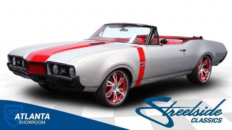 Oldsmobile-Cutlass-1968-Peruvian-Silver-Red