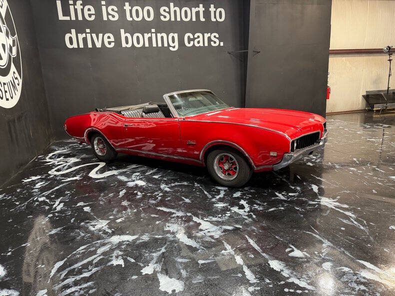 Oldsmobile-Cutlass-1969-Red-Black