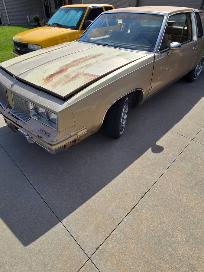 Oldsmobile-Cutlass-supreme-1986-brown