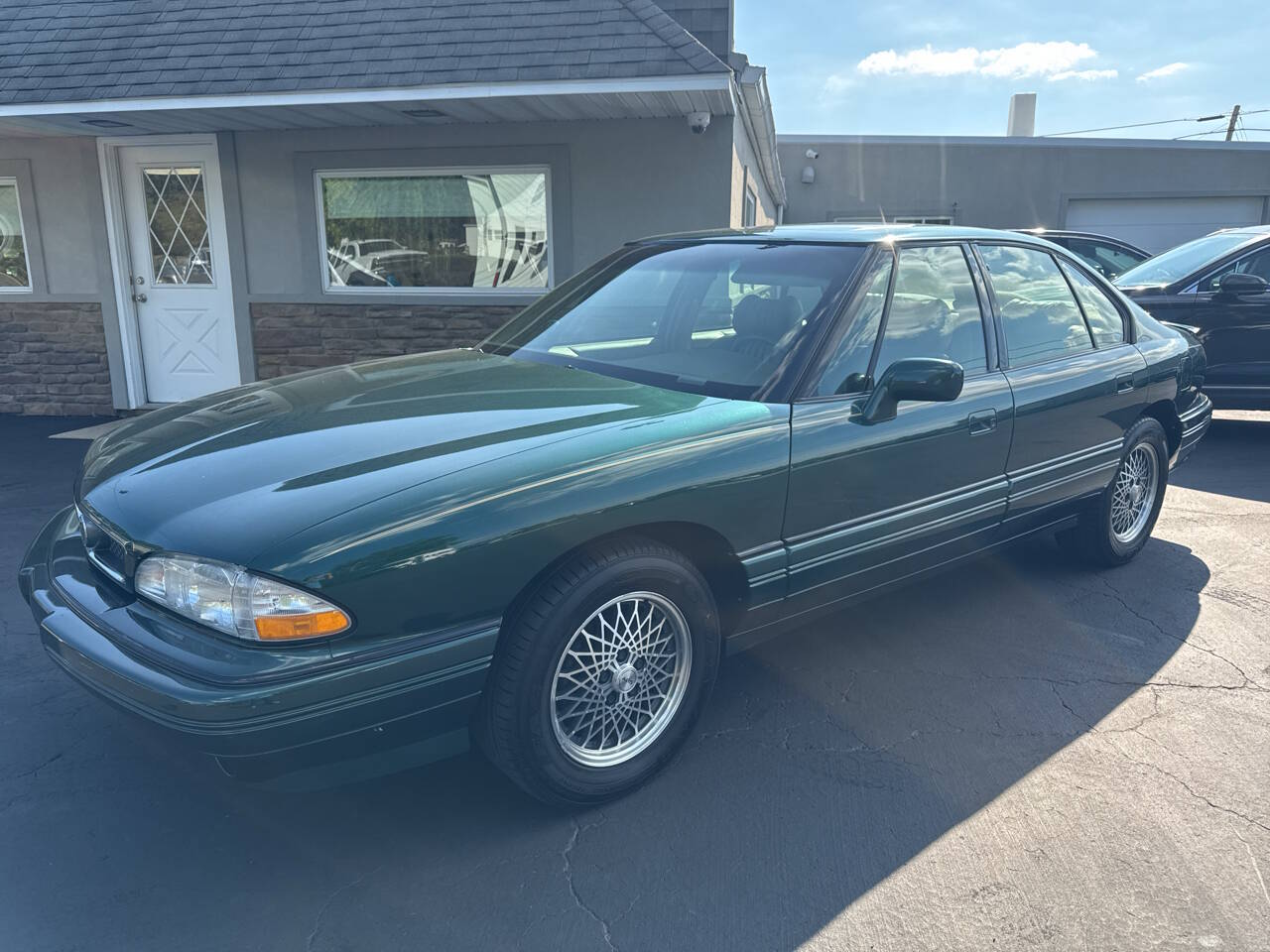 Pontiac-Bonneville-1995-Green-Tan