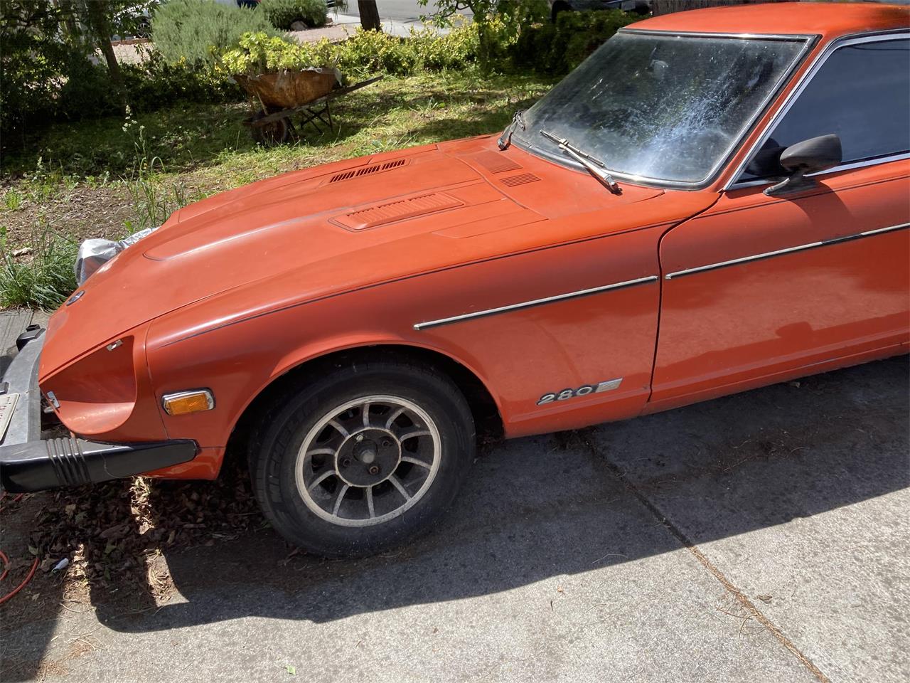 Datsun-280z-1977-redorange-Black