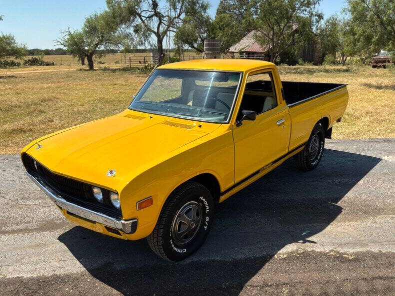 Datsun-620-1972-Mellow-Yellow-Black