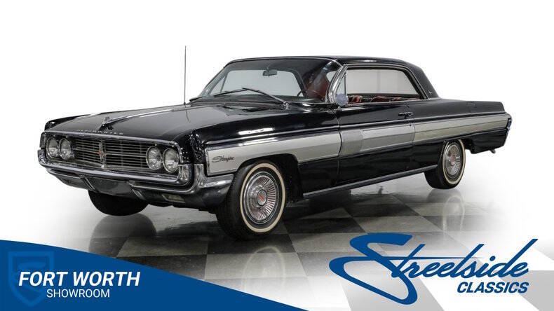 Oldsmobile-Starfire-1962-Ebony-Black-Medium-Red