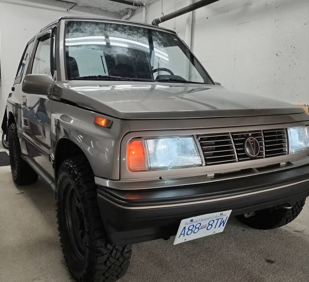 Pontiac-Sunrunner-sidekick-1995-Gray